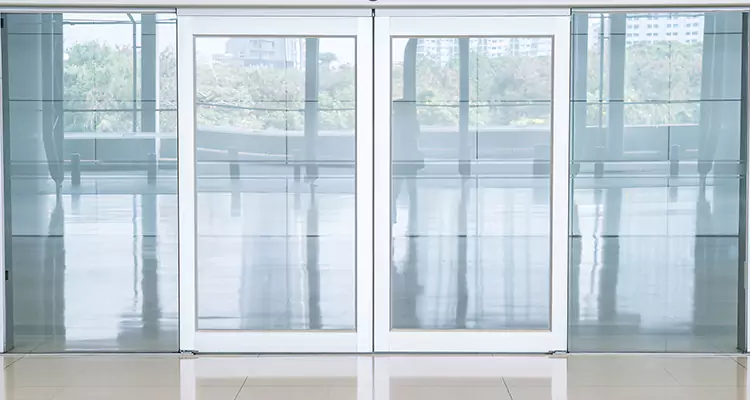Commercial Door Aluminum Capping Repair in Ives Estates, FL