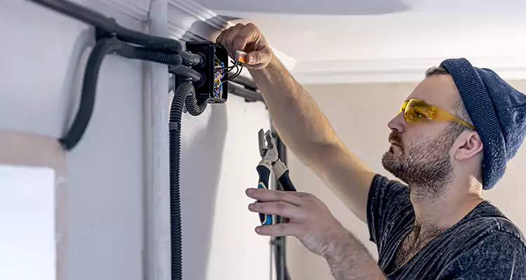 Garage Door Opener Cable Repair in Ives Estates, FL