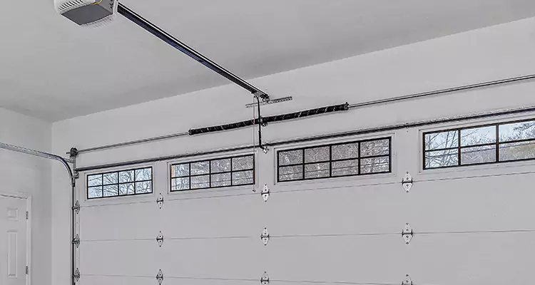 Garage Door Torsion Spring Repair in Ives Estates, FL