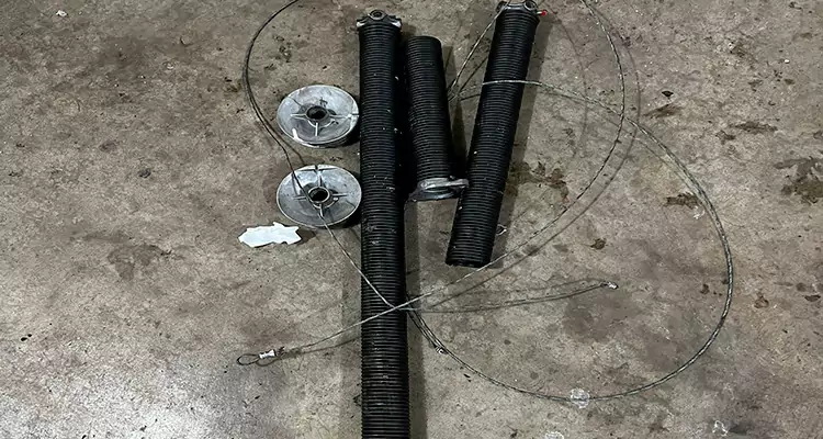 Wayne Dalton Garage Door Spring Replacement in Ives Estates, FL