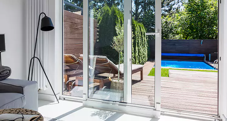Fixing A Sliding Screen Door Roller in Ives Estates, FL